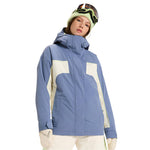 Roxy Women's Ritualized Insulated Jacket 2025 - A blue and white jacket with a hood, worn by a model from the waist up against a light gray background.