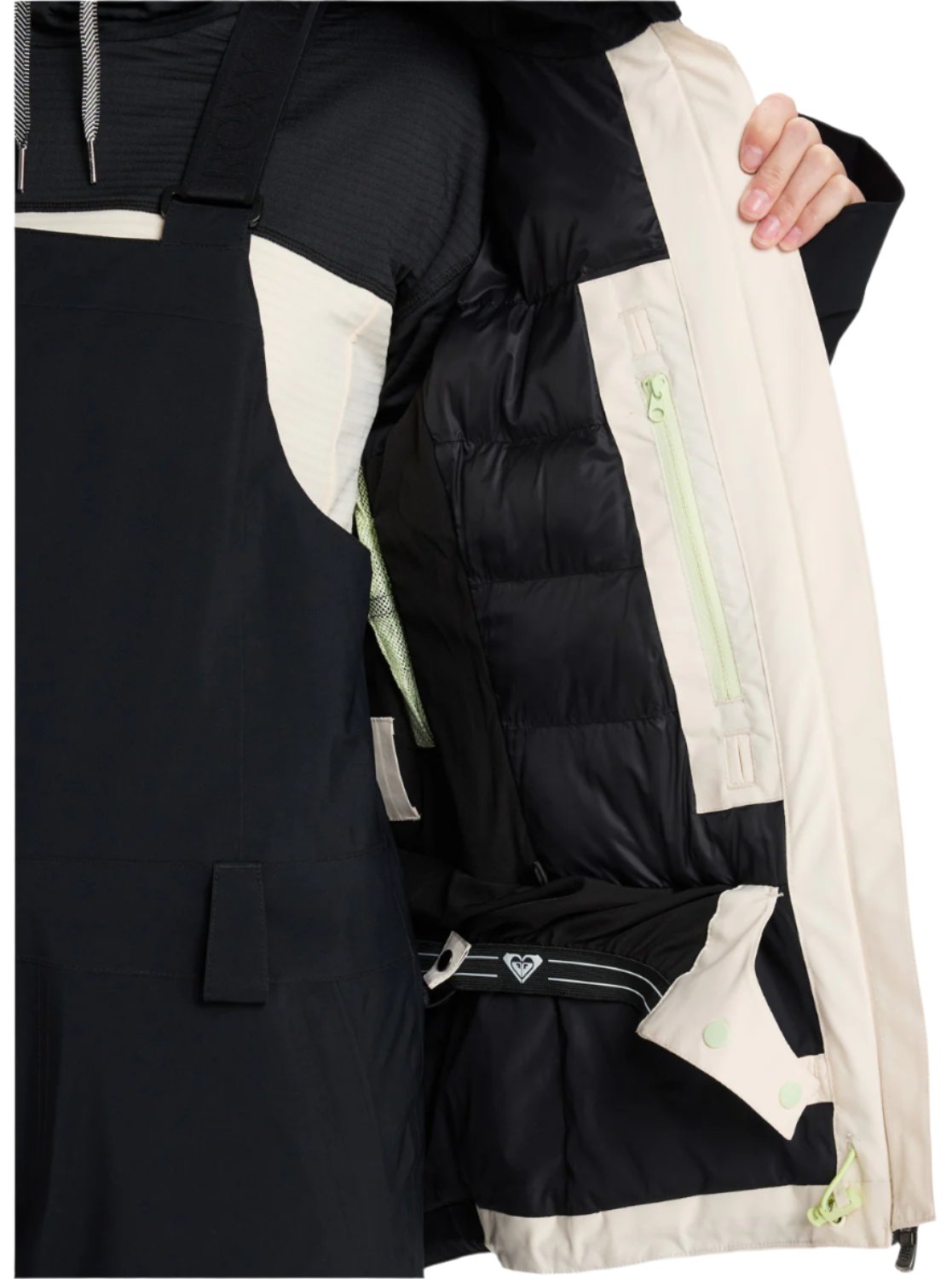 Roxy Women's Wild Twist Jacket 2025 - A black jacket with a white stripe on the sleeve and a zippered pocket on the side.