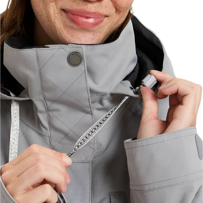 Roxy Women's Billie Insulated Jacket 2025 - A light gray jacket with a black hood and white drawstrings.