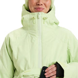 Roxy Radiant Lines Overhead Jacket 2025 - A light green jacket with a hood and drawstring waist, featuring a small black logo on the left shoulder.