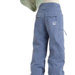 Roxy Women's Chloe Kim Insulated Pant 2025 - Light blue snow pants with a subtle floral pattern on the side of one leg, featuring a zippered pocket and adjustable cuffs.