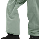Roxy Women's Chloe Kim Insulated Pant 2025 - Sage green insulated snow pants with white stitching and a zippered pocket on the thigh.
