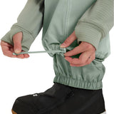 Roxy Women's Chloe Kim Insulated Pant 2025 - Sage green insulated snow pants with white stitching and a zippered pocket on the side of one leg.