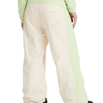 Roxy Women's Steeply Shell Pant 2025 - A pair of cream-colored snow pants with a light green stripe down the side.