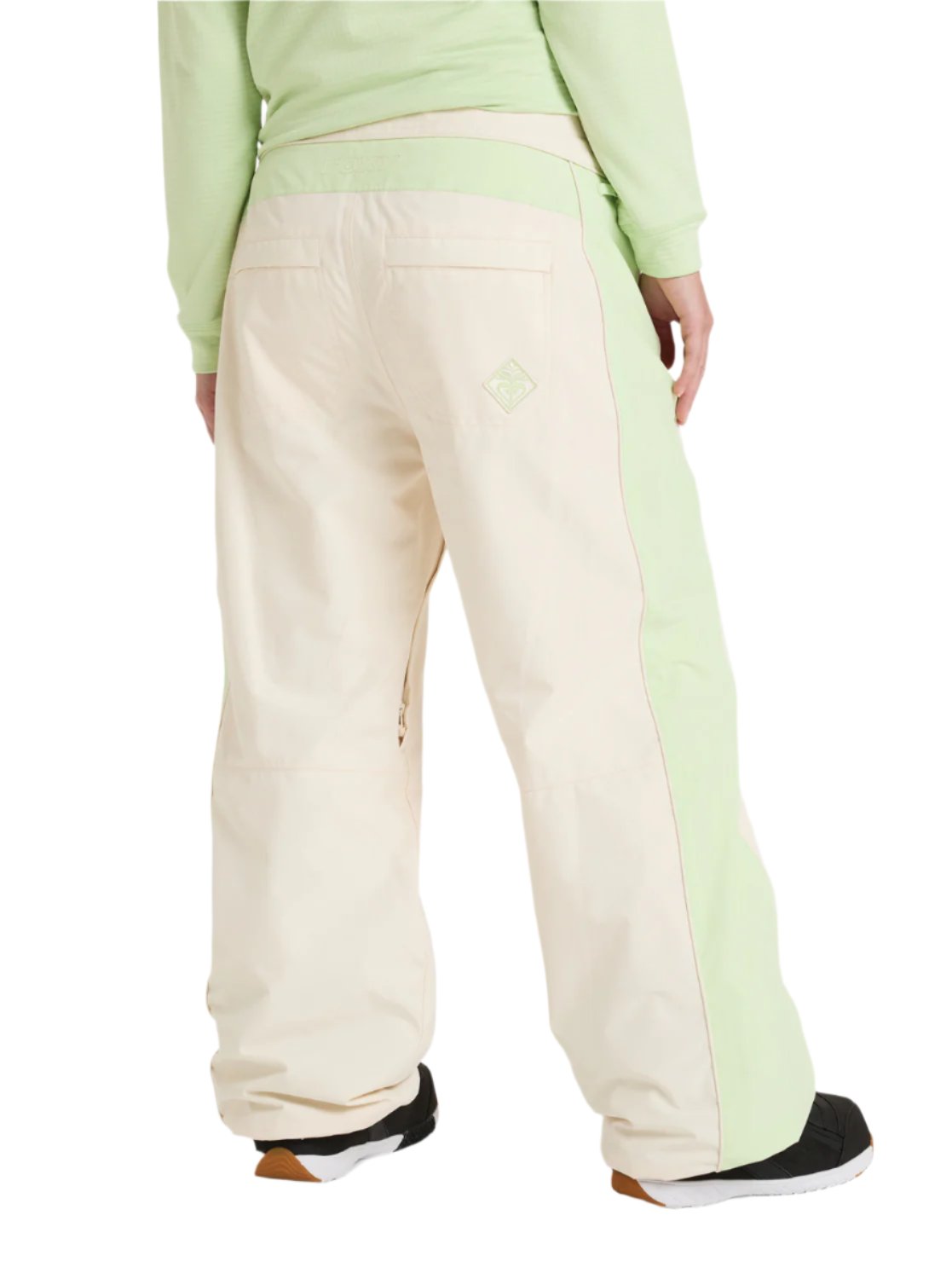 Roxy Women's Steeply Shell Pant 2025 - A pair of cream-colored snow pants with a light green stripe down the side.