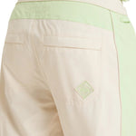 Roxy Women's Steeply Shell Pant 2025 - A pair of light green snow pants with a subtle pattern and zippered pockets.