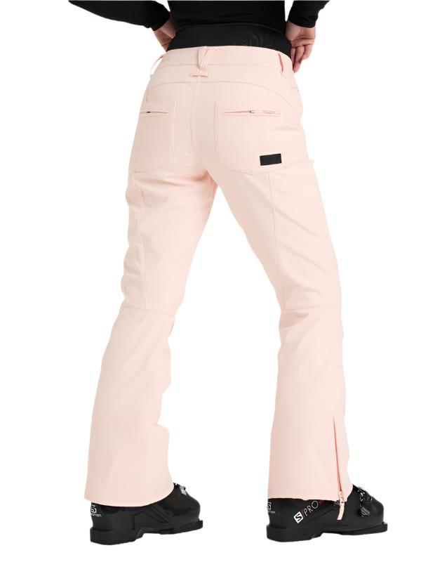 Roxy Women's Rising High Pant 2025 - Light pink snow pants with a zippered pocket on the right thigh and a black label near the back pocket.