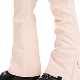 Roxy Women's Rising High Pant 2025 - Light pink snow pants with a subtle geometric pattern on the left leg, featuring a zippered pocket and adjustable cuffs.