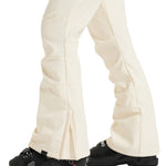 Roxy Women's Rising High Pant 2025 - A pair of cream-colored snow pants with a subtle pattern and zippered pockets.