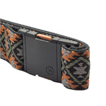 Arcade Twilight Belt Slim 2025 - A black belt with a subtle orange, gray, and green geometric pattern on its woven strap.