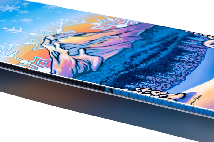 Lib Tech Women's Glider Snowboard 2026 - A snowboard with a blue and orange graphic of a woman riding down a mountain.
