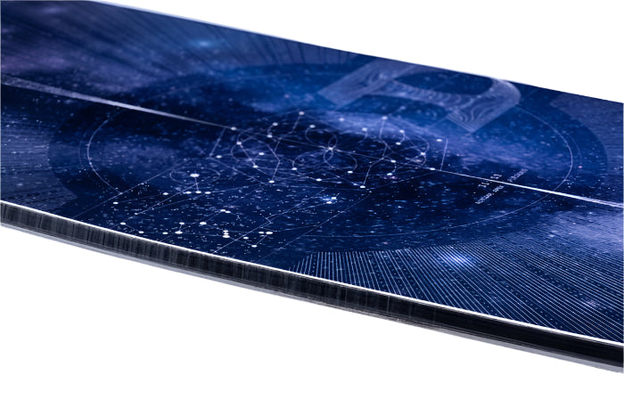 Lib Tech Golden Orca Snowboard 2026 - A dark blue snowboard with a white geometric pattern and a black stripe along the bottom edge.