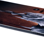 Lib Tech Skunk Ape Camber Snowboard 2026 - Brown snowboard with a black and white abstract design on top of it.