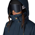 Women's 3-in-1 jacket in dark navy, hooded face close-up with goggles