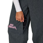 Women's dark gray shell pants with Metallica graphic patch and side pocket