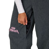 Women's dark gray shell pants with Metallica graphic patch and side pocket