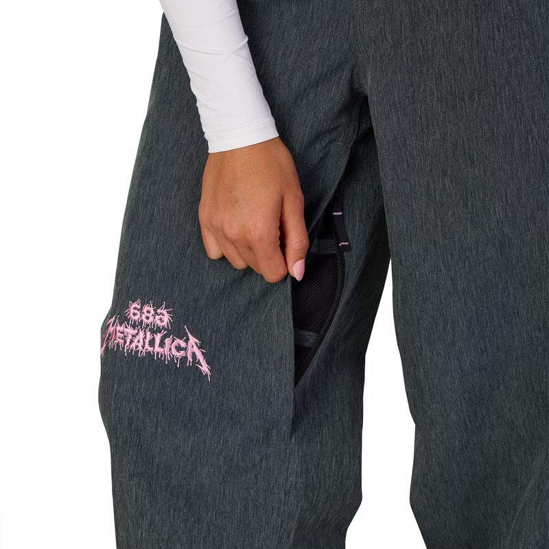 Women's dark gray shell pants with Metallica graphic patch and side pocket