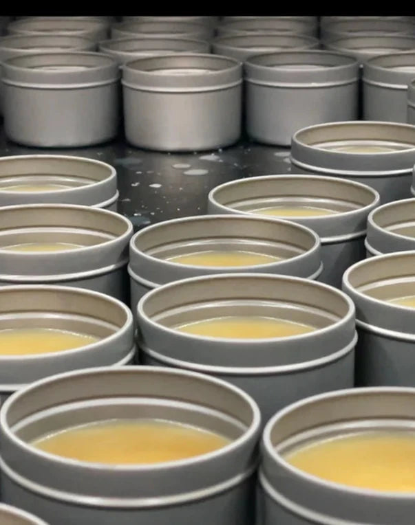 Oneball Leather Waterproofing Glove Wax - A yellowish wax in a round metal tin with a screw-top lid.