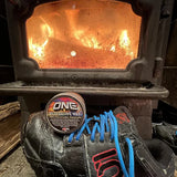 Oneball Leather Waterproofing Glove Wax - A small round tin of dark brown wax with a label that says "ONE" in white letters and "ECO GLOVE WAX" in smaller text below.