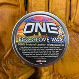 Oneball Leather Waterproofing Glove Wax - A round tin of wax with a label that says "ONE" in large white letters, and below it, "ECO GLOVE WAX", on top of an image of a pair of brown leather gloves.