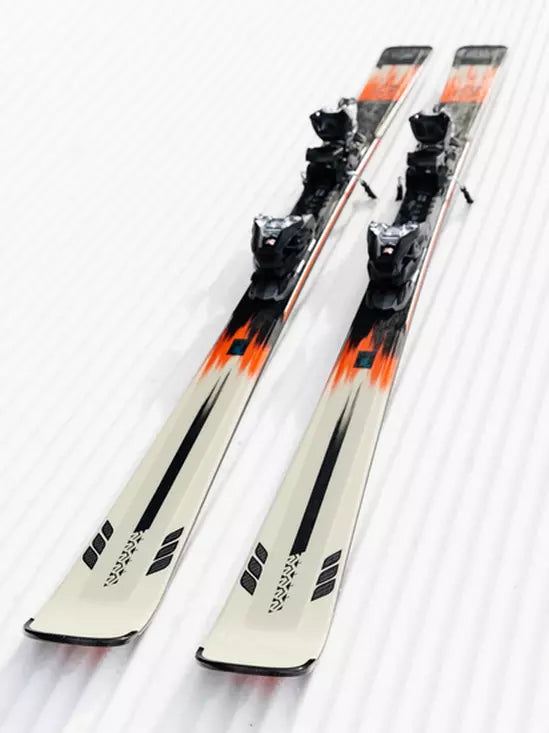 K2 Disruption MTI skis with MXC 12 bindings feature a white and black design.