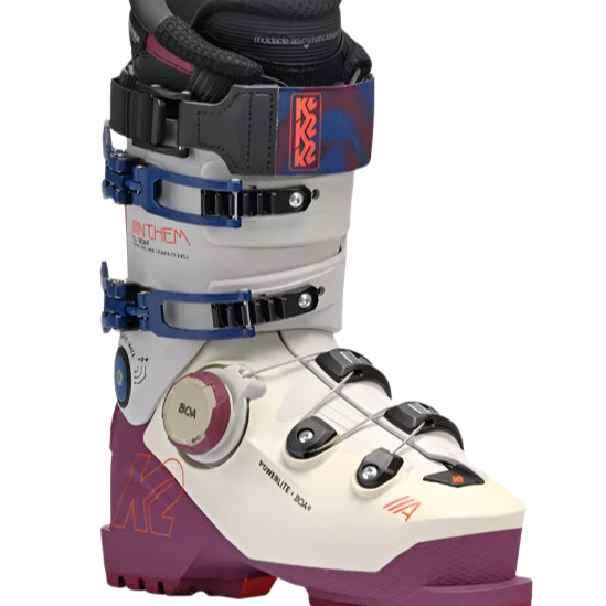 K2 Anthem 115 BOA women’s ski boots feature a white and burgundy color scheme with visible BOA adjustment dials.