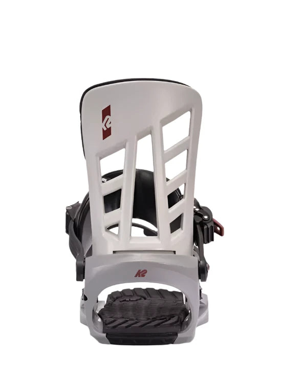 K2 Indy 2025 snowboard binding, white base with black straps and red accents.