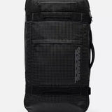 K2 Luggage roller bag, black with a grid pattern, features durable wheels and reinforced handles.