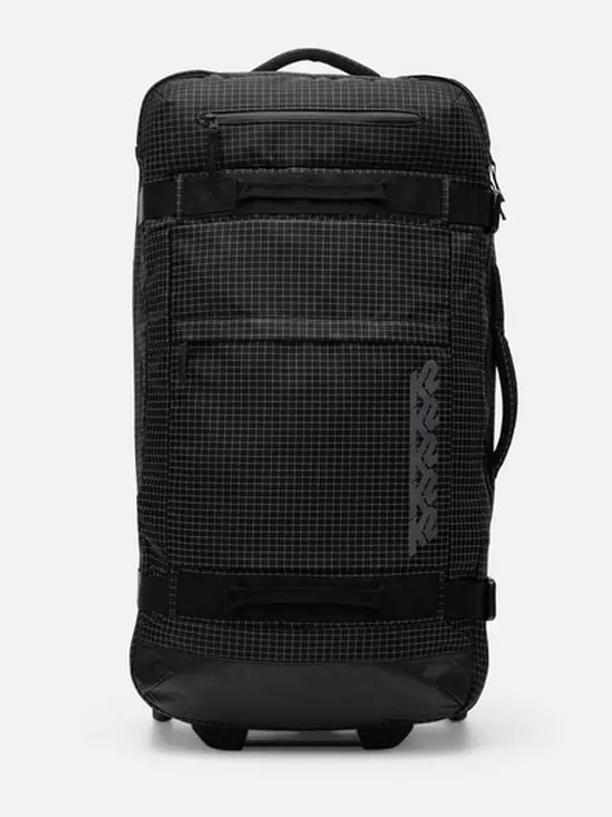 K2 Luggage roller bag, black with a grid pattern, features durable wheels and reinforced handles.