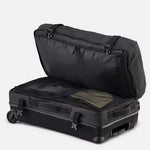 Black K2 Luggage Roller Bag 2025 with textured pattern and silver hardware.