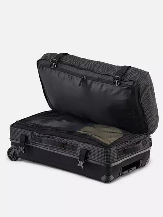 Black K2 Luggage Roller Bag 2025 with textured pattern and silver hardware.