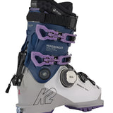 K2 Mindbender 105 BOA ski boots feature a white and purple design with visible BOA adjustment dials.