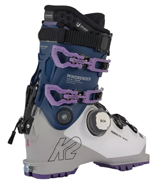 K2 Mindbender 105 BOA ski boots feature a white and purple design with visible BOA adjustment dials.