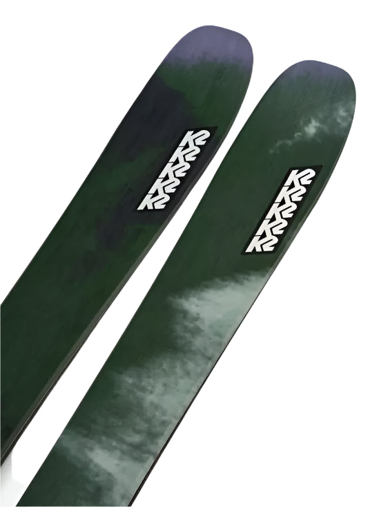 K2 Women's Mindbender 106C skis 2025 feature a red and white design with a distinctive graphic.