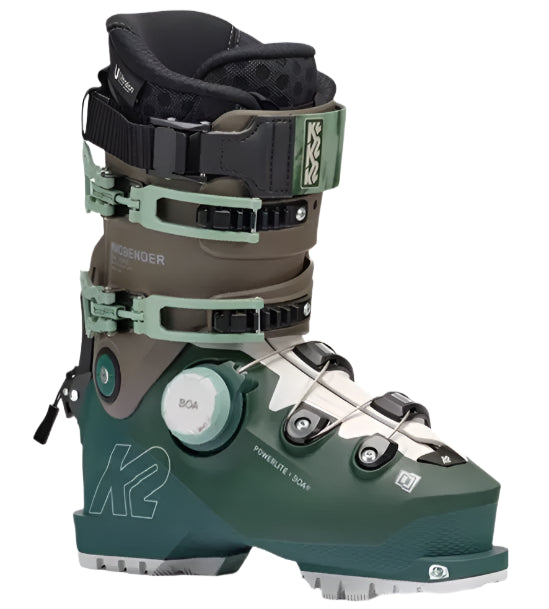 K2 Mindbender 115 BOA women’s ski boots feature a green and white color scheme with visible BOA adjustment dials.
