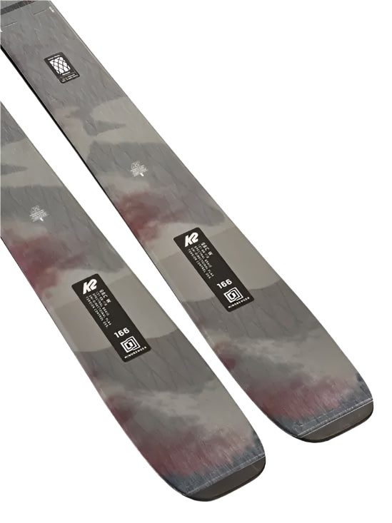 K2 Mindbender 96C skis, 2025 model, feature a distinctive red and black graphic design.