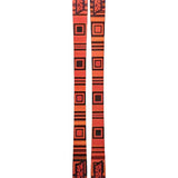 K2 Women's Omen 90 skis 2025 feature a red and black geometric design.