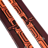 K2 Women's Omen 90 skis 2025 feature a distinctive red and black graphic design.