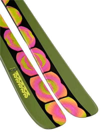 K2 Omen 90 skis 2025 feature a striking green and pink design.