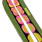 K2 Omen 90 skis 2025 feature a vibrant pink and black graphic design.