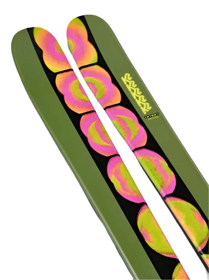 K2 Omen 90 skis 2025 feature a vibrant pink and black graphic design.