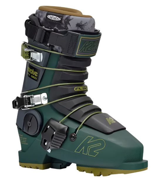 K2 Revolve Team ski boots feature a dark green and yellow color scheme with visible hardware.