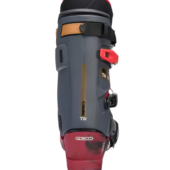 K2 Revolve TW ski boots feature a black and orange design with silver accents.