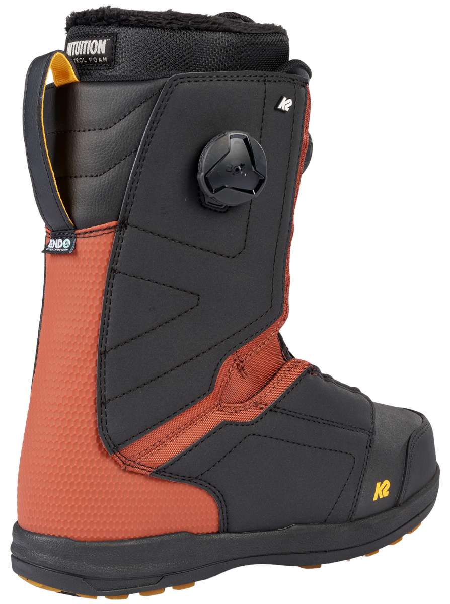 K2 Hanford 2023 snowboard boot features a black and orange color scheme with a visible Boa dial.