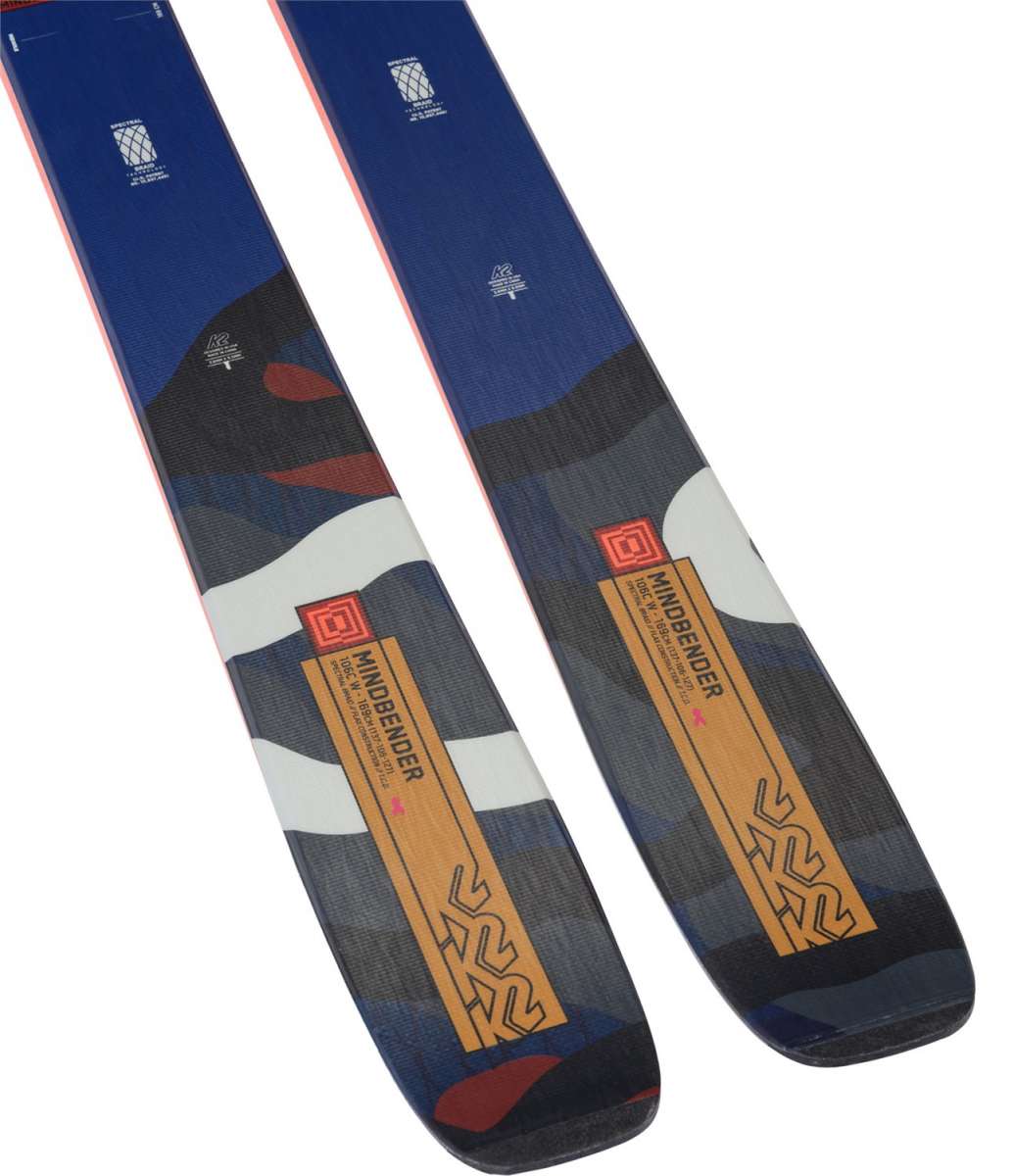 K2 Women's Mindbender 106C skis feature a distinctive blue and white graphic design.