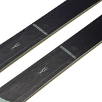 K2 Women's Mindbender 99Ti Wide skis feature a distinctive red and white design.