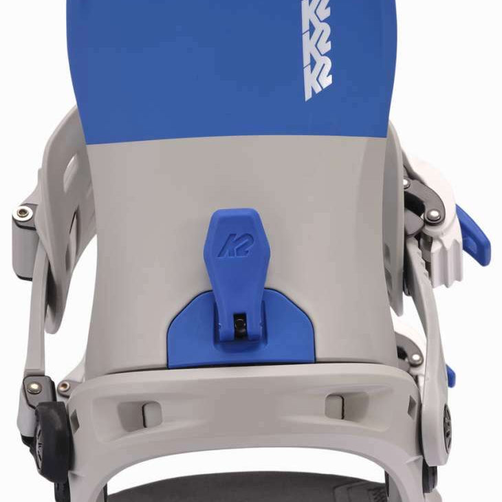 K2 Women's Network snowboard binding, featuring a white base with blue accents and a distinctive design.