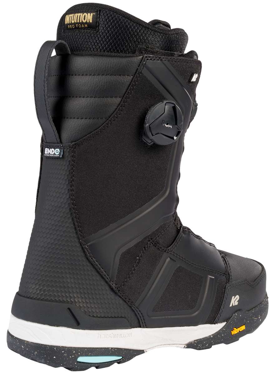 Black K2 Orton snowboard boot with red accents and a gray Vibram sole.