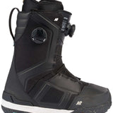 Black K2 Orton snowboard boot features a black and white design with a BOA lacing system and Vibram sole.