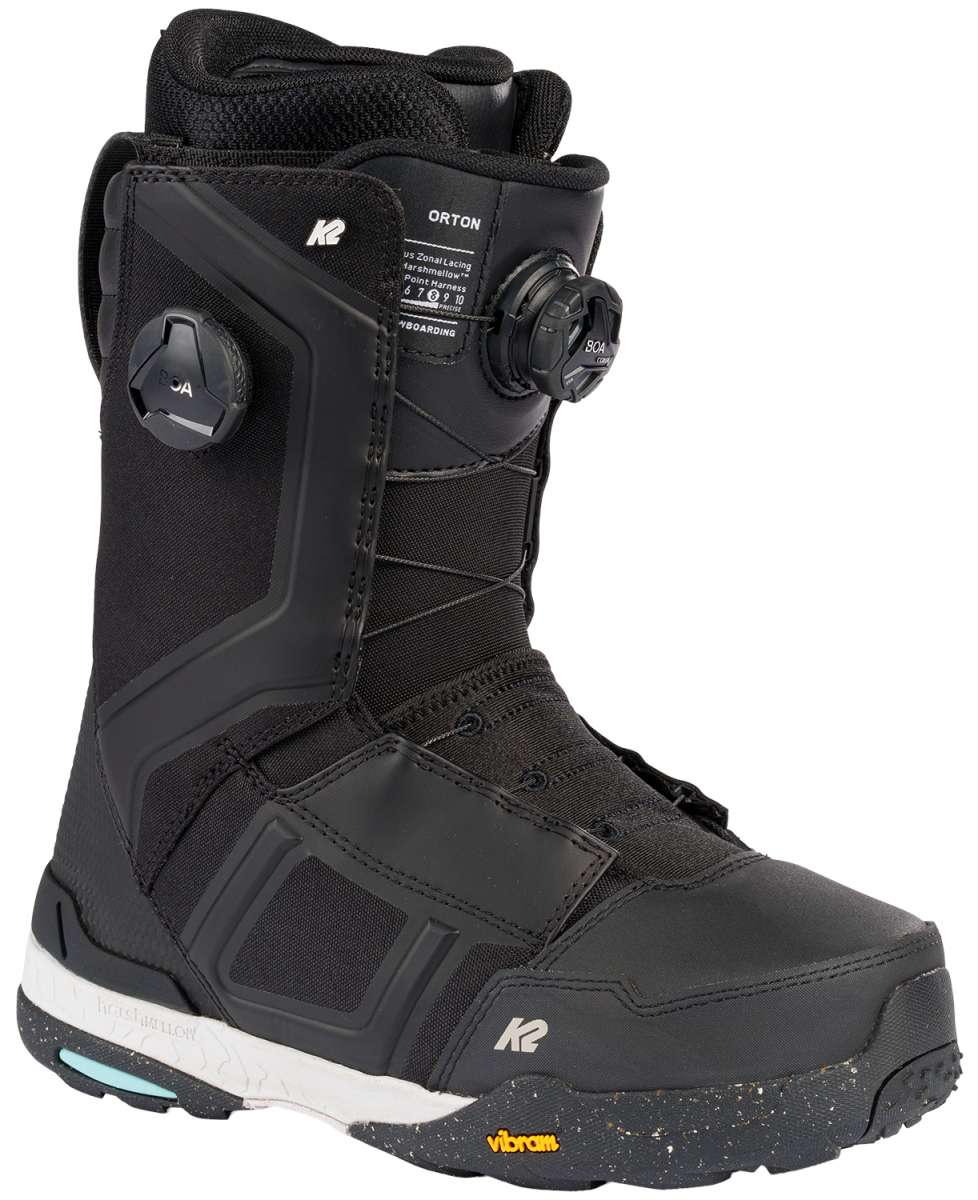 Black and white K2 Orton snowboard boot with a blue sole and Boa lacing system.